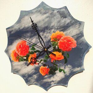 orange roses in the sky clock